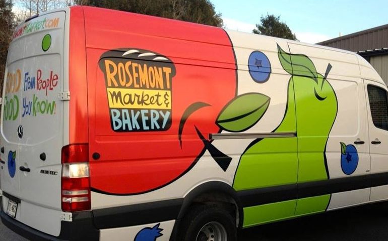 A van with the words Rosemont Market & Bakery on it