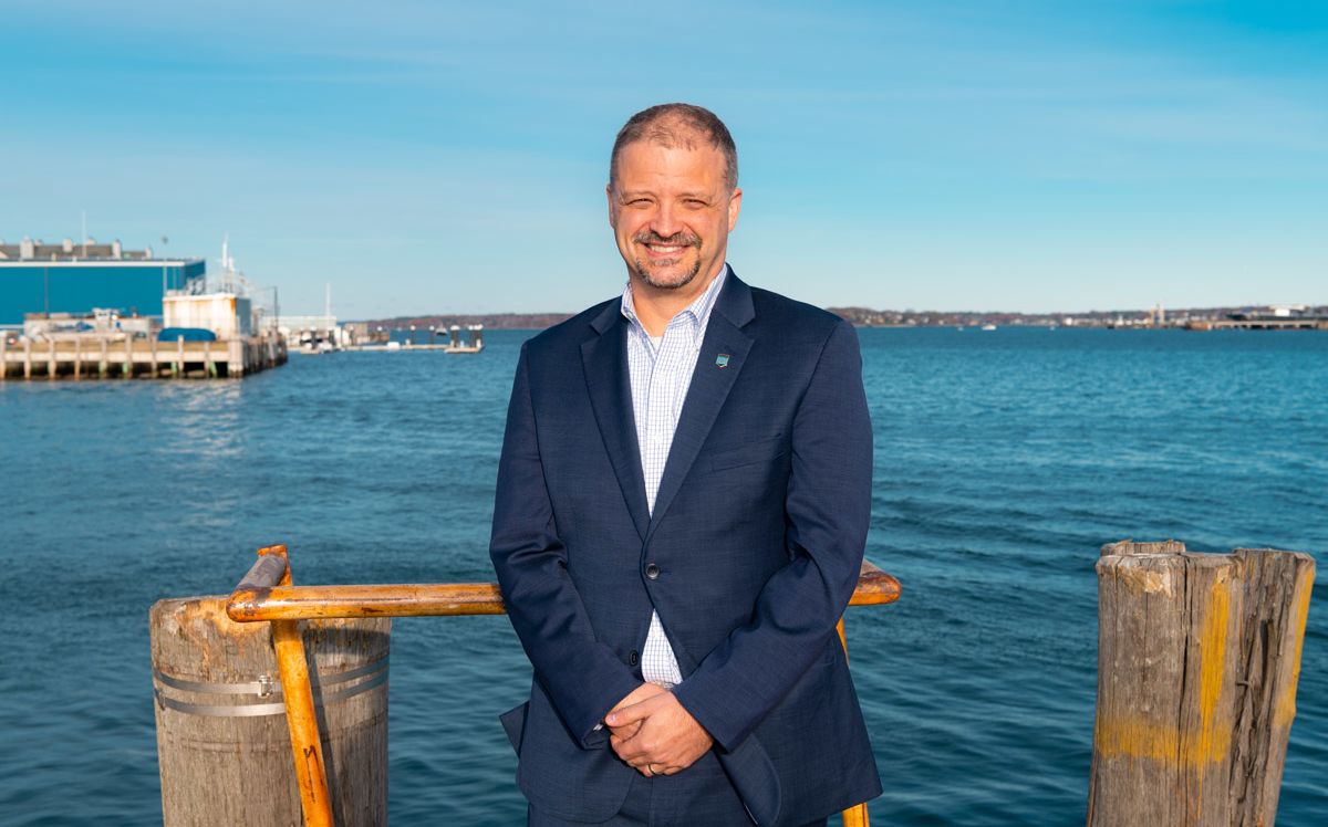 man standing on a pier